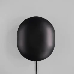 Clam vägglampa burned black