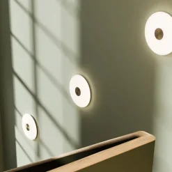 Glint 36 vägglampa mässing/opalglas