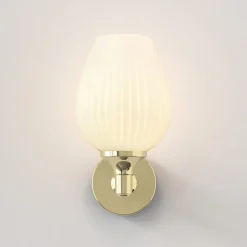 Liberty vägglampa IP44 mässing