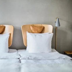 Miller vägglampa Swing silkesgrå/mässing
