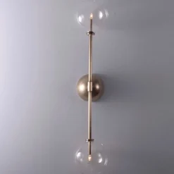 Miron vägglampa mässing