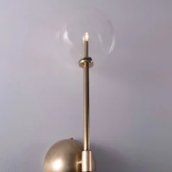 Miron vägglampa mässing