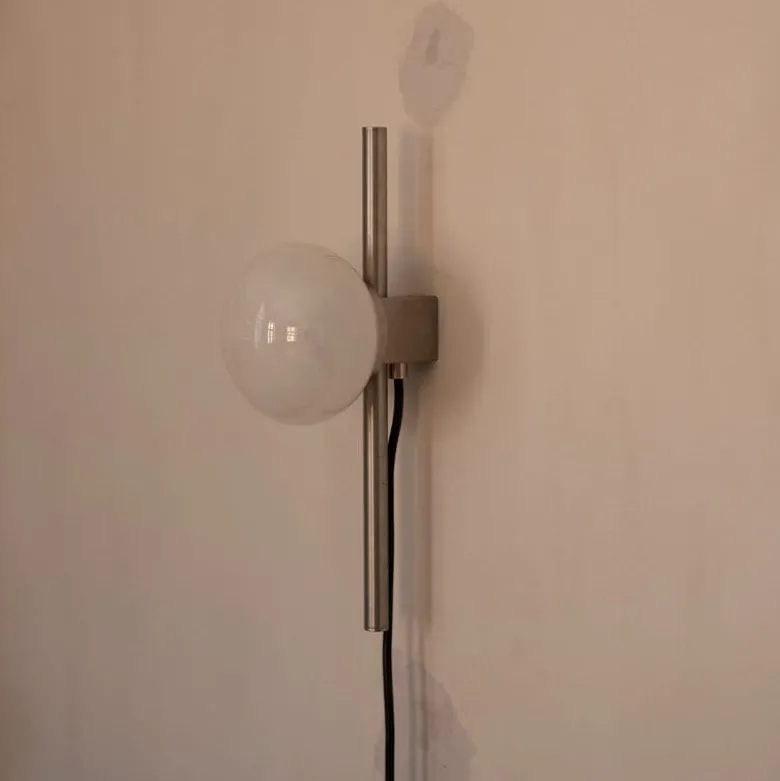 Ovoid single vägglampa stainless steel