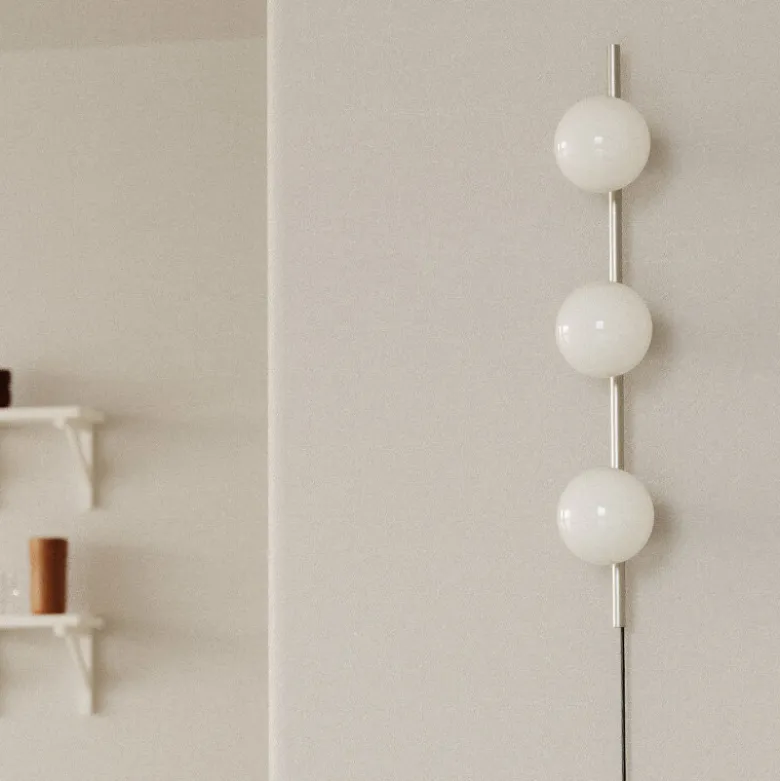 Ovoid triple vägglampa stainless steel