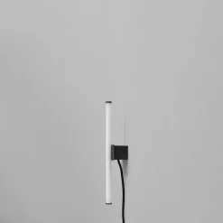 Stick vägglampa bronze