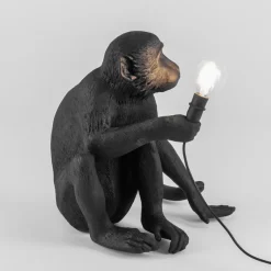 The Monkey Lamp sitting outdoor Bordslampa svart