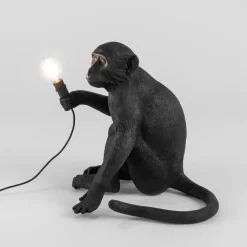 The Monkey Lamp sitting outdoor Bordslampa svart