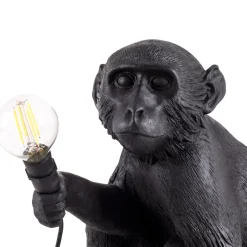 The Monkey Lamp sitting outdoor Bordslampa svart