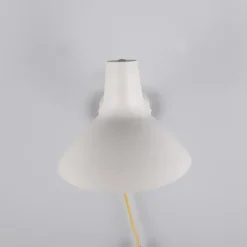 Traveller vägglampa varm grå/mässing